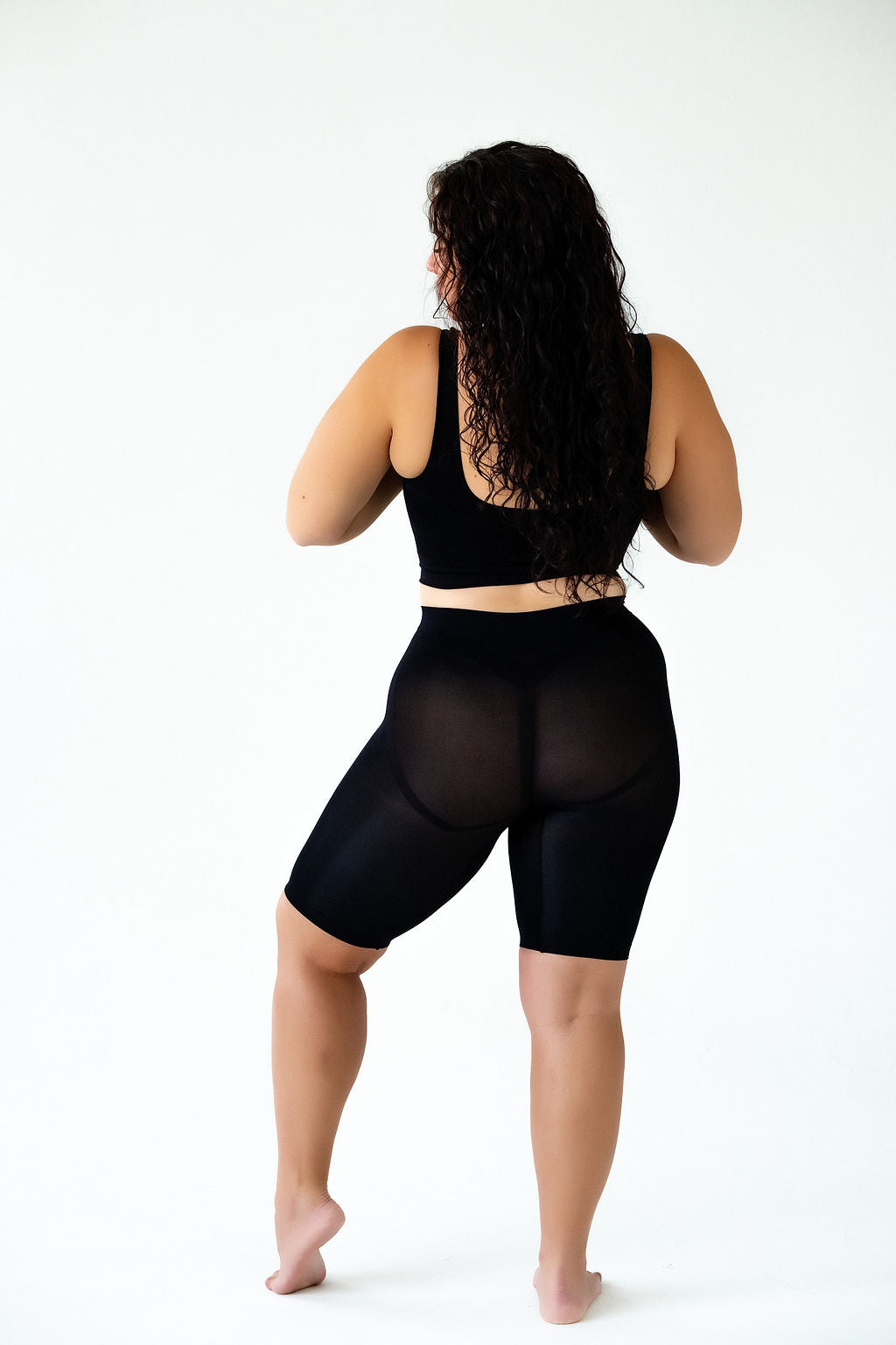 Back view of Classic Cooling in black, showing a smooth seamless fit