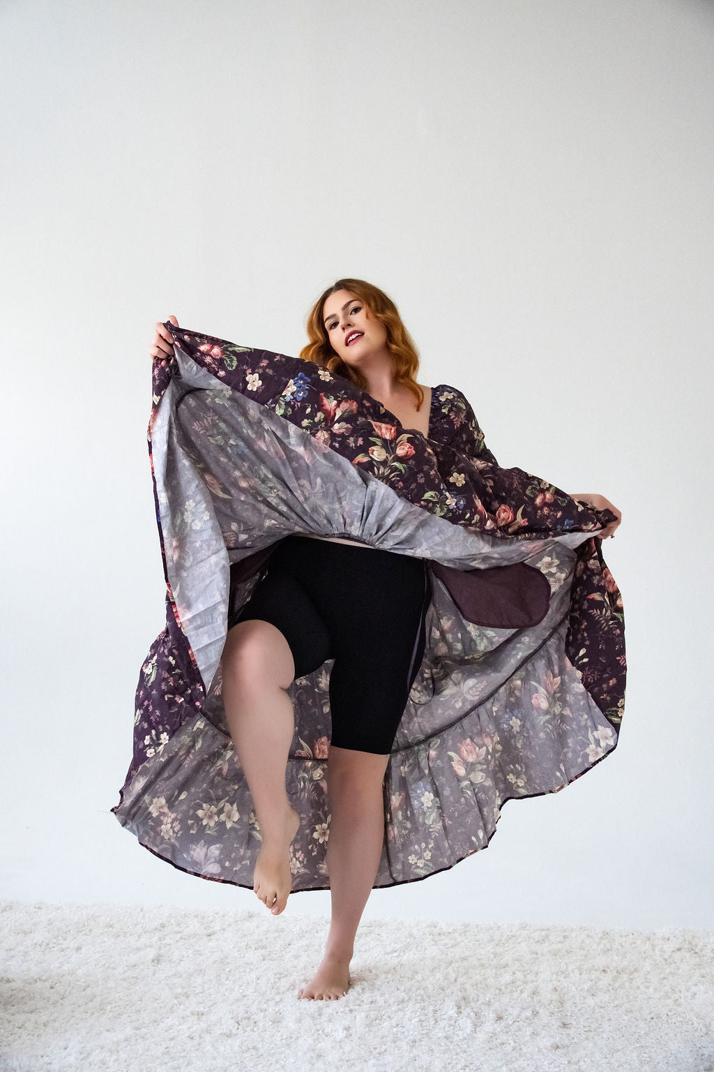 Classic Cooling in black worn under a floral wrap dress, giving coverage in motion
